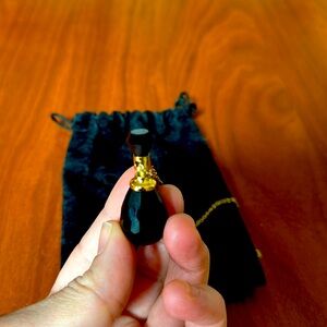Black crystal pendant.
